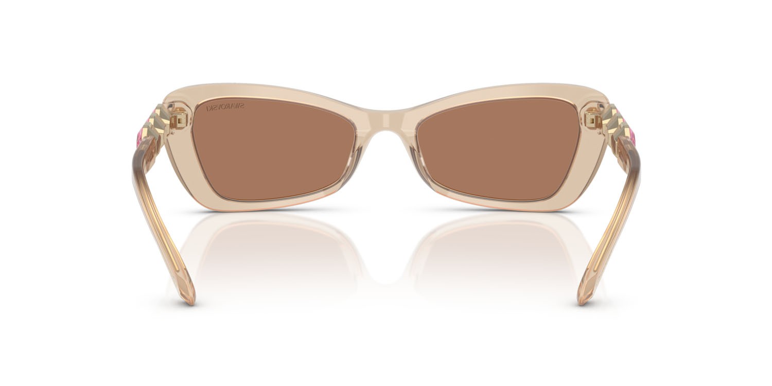 Occhiali da sole Swarovski SK 6033 (106673) colore beige perlaceo forma irregolare lenti marrone