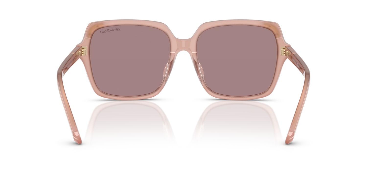 Occhiali da sole Swarovski SK 6034D (10257N) colore rosa perlaceo forma quadrato lenti viola chiaro/marrone