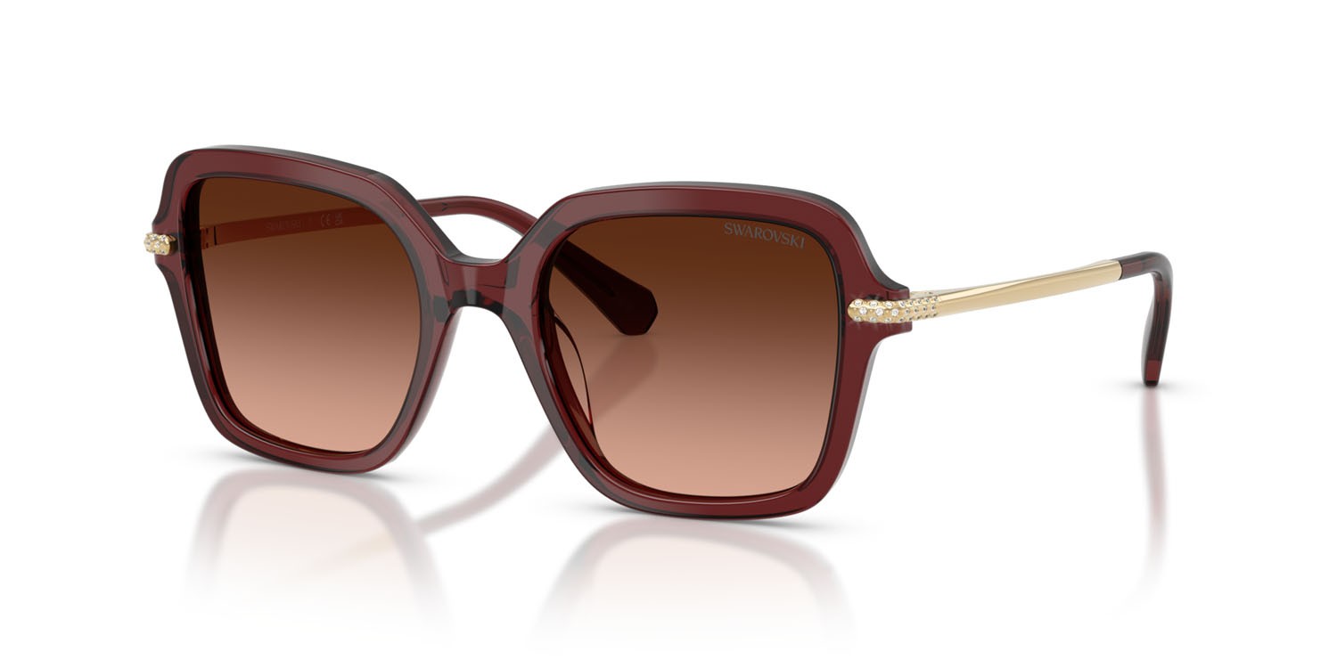 Occhiali da sole Swarovski SK 6040 (10735M) colore borgogna trasparente forma irregolare lenti rosa sfumato grigio