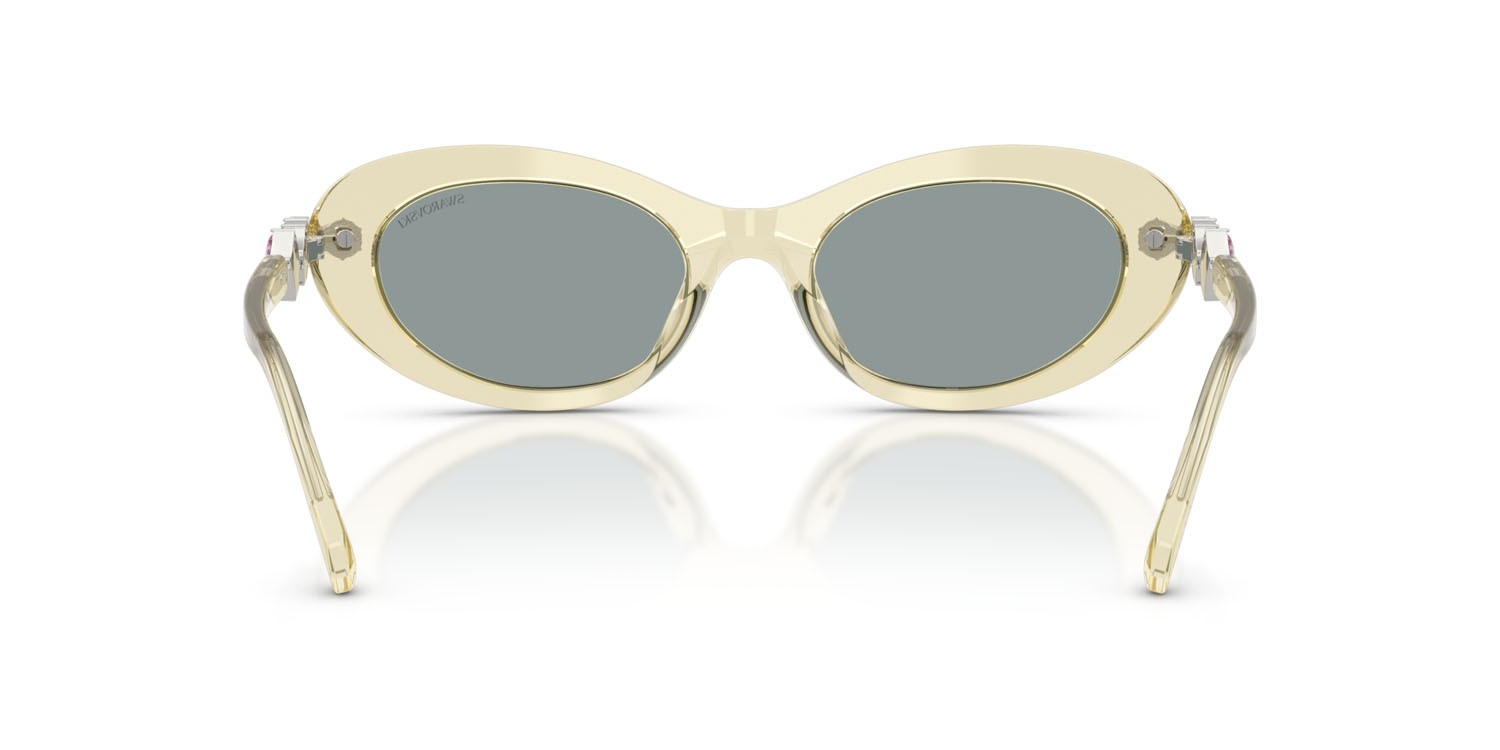 Sunglasses Swarovski SK 6042 (1080/1) color giallo trasparente shape oval lenses grigio