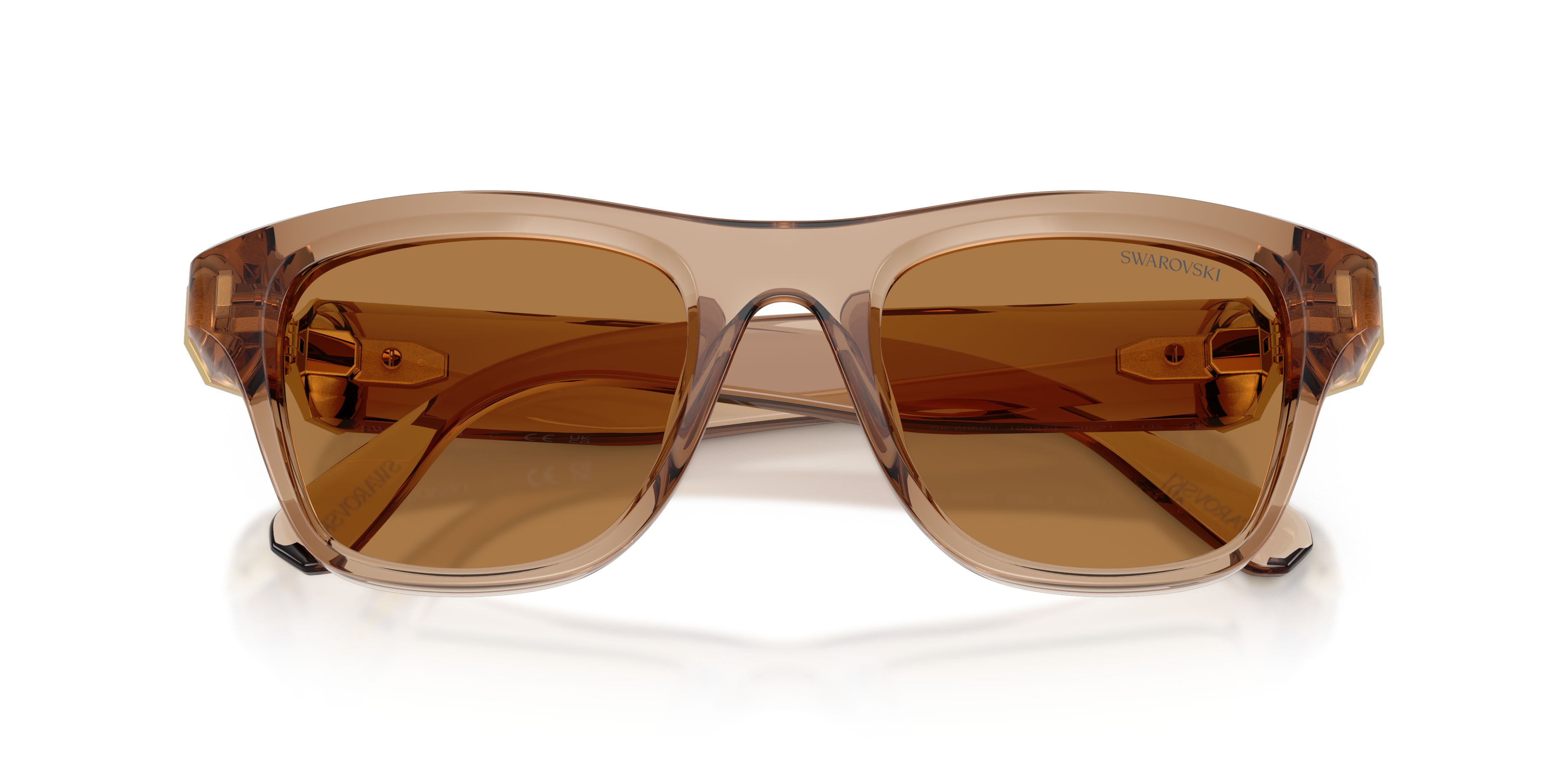 Sunglasses Swarovski SK 6056U (109273) color beige trasparente shape square lenses bronzo