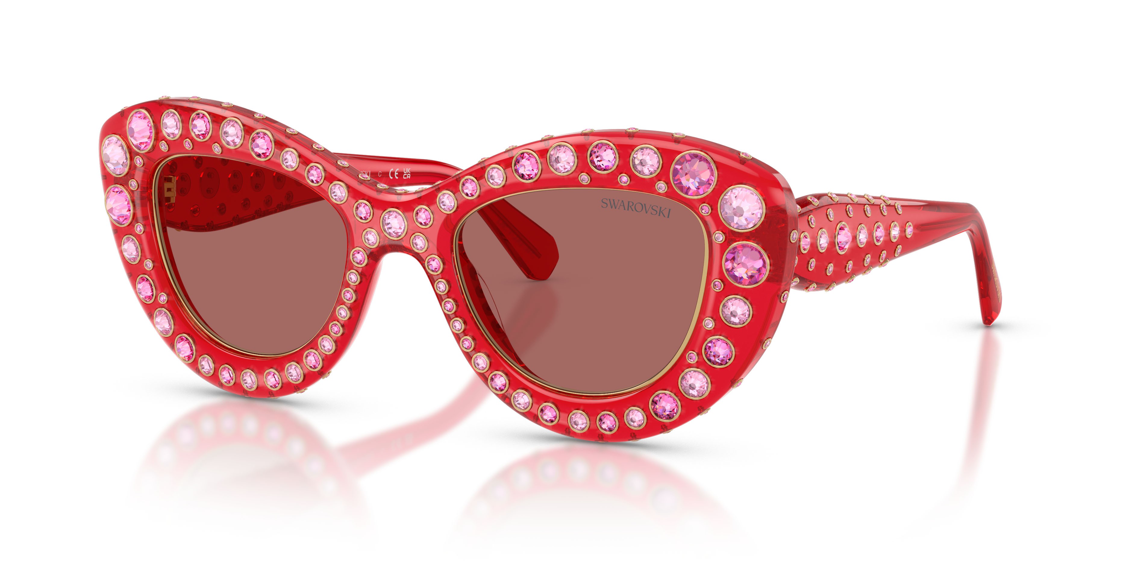 Sunglasses Swarovski SK 6060 (110369) color rosso trasparente shape cat eye lenses violetto scuro