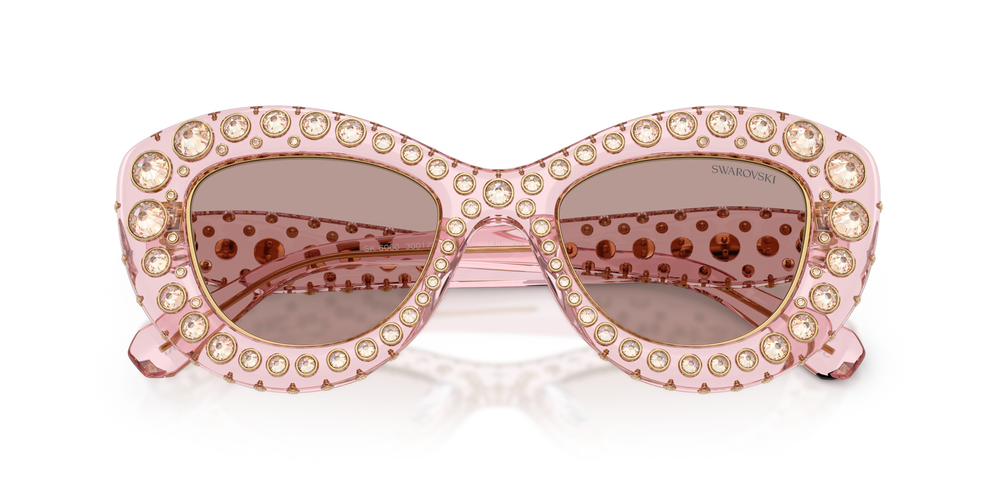 Sunglasses Swarovski SK 6060 (30017N) color rosa trasparente shape cat eye lenses viola chiaro/marrone