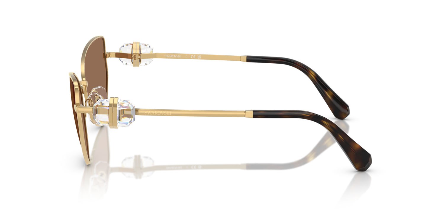 Occhiali da sole Swarovski SK 7003 (400473) colore oro forma irregolare lenti marrone scuro