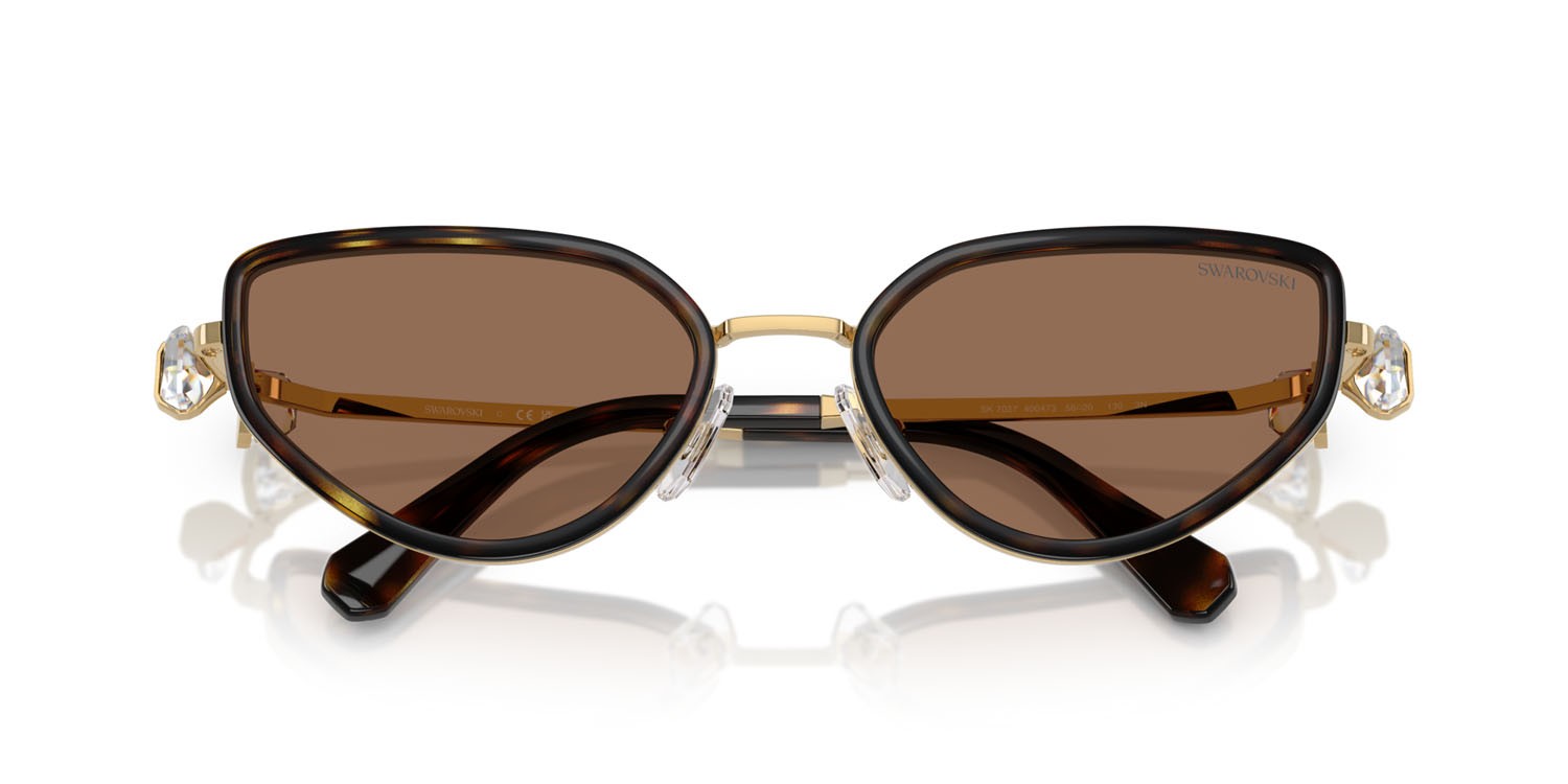 Sunglasses Swarovski SK 7027 (400473) color oro/havana shape irregular lenses marrone scuro