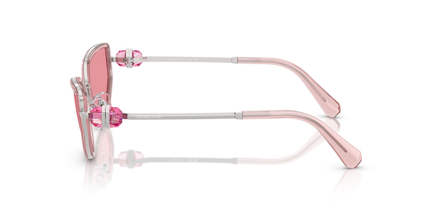 Sunglasses Swarovski SK 7027 (403784) color argento/rosa shape irregular lenses rosa