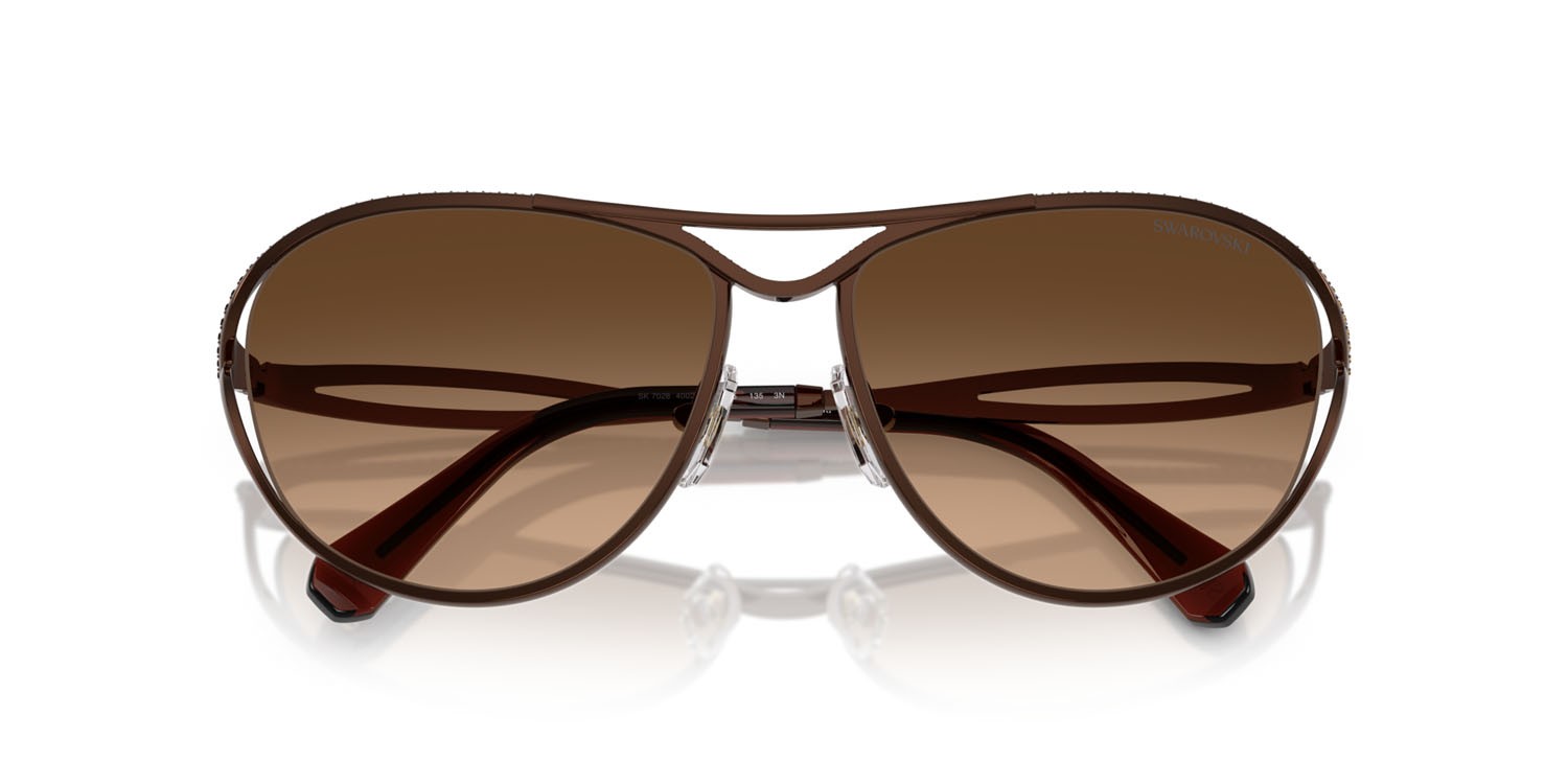 Sunglasses Swarovski SK 7028 (400274) color marrone shape aviator lenses marrone sfumato
