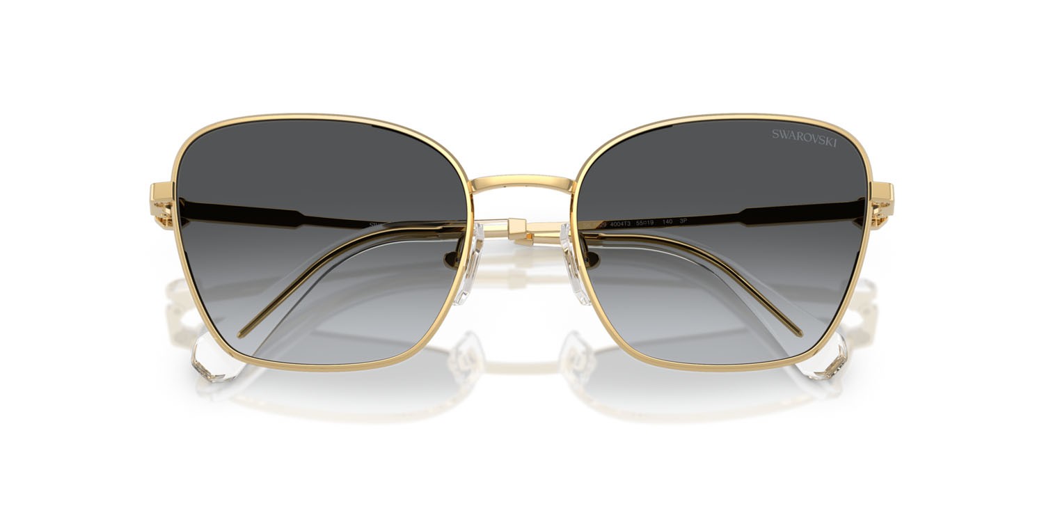 Sunglasses Swarovski SK 7029 (4004T3) color oro shape aviator lenses polarizzata grigio sfumato