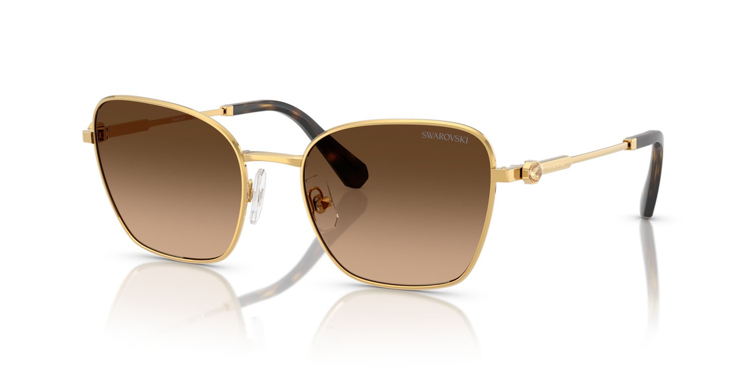 Sunglasses Swarovski SK 7029 (400774) color giallo oro shape aviator lenses verde sfumato marrone