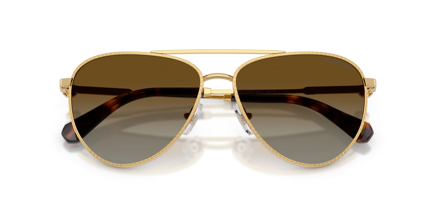 Sunglasses Swarovski SK 7031 (4037T5) color oro shape aviator lenses polarizzata marrone sfumato