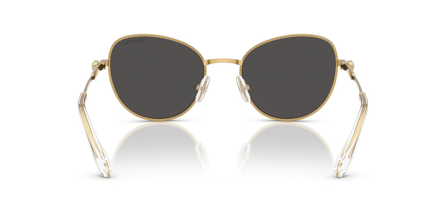 Sunglasses Swarovski SK 7032 (400487) color oro shape round lenses grigio scuro