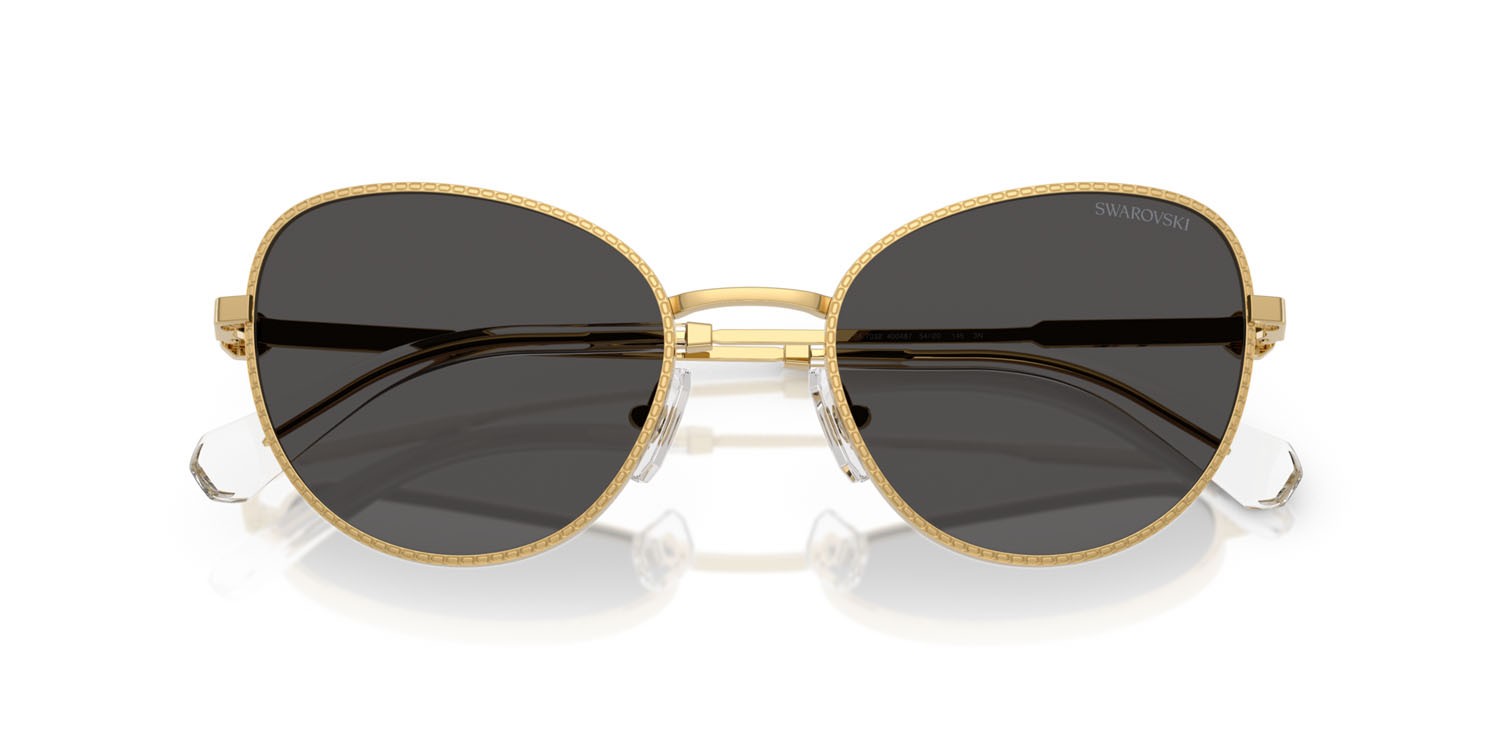 Sunglasses Swarovski SK 7032 (400487) color oro shape round lenses grigio scuro
