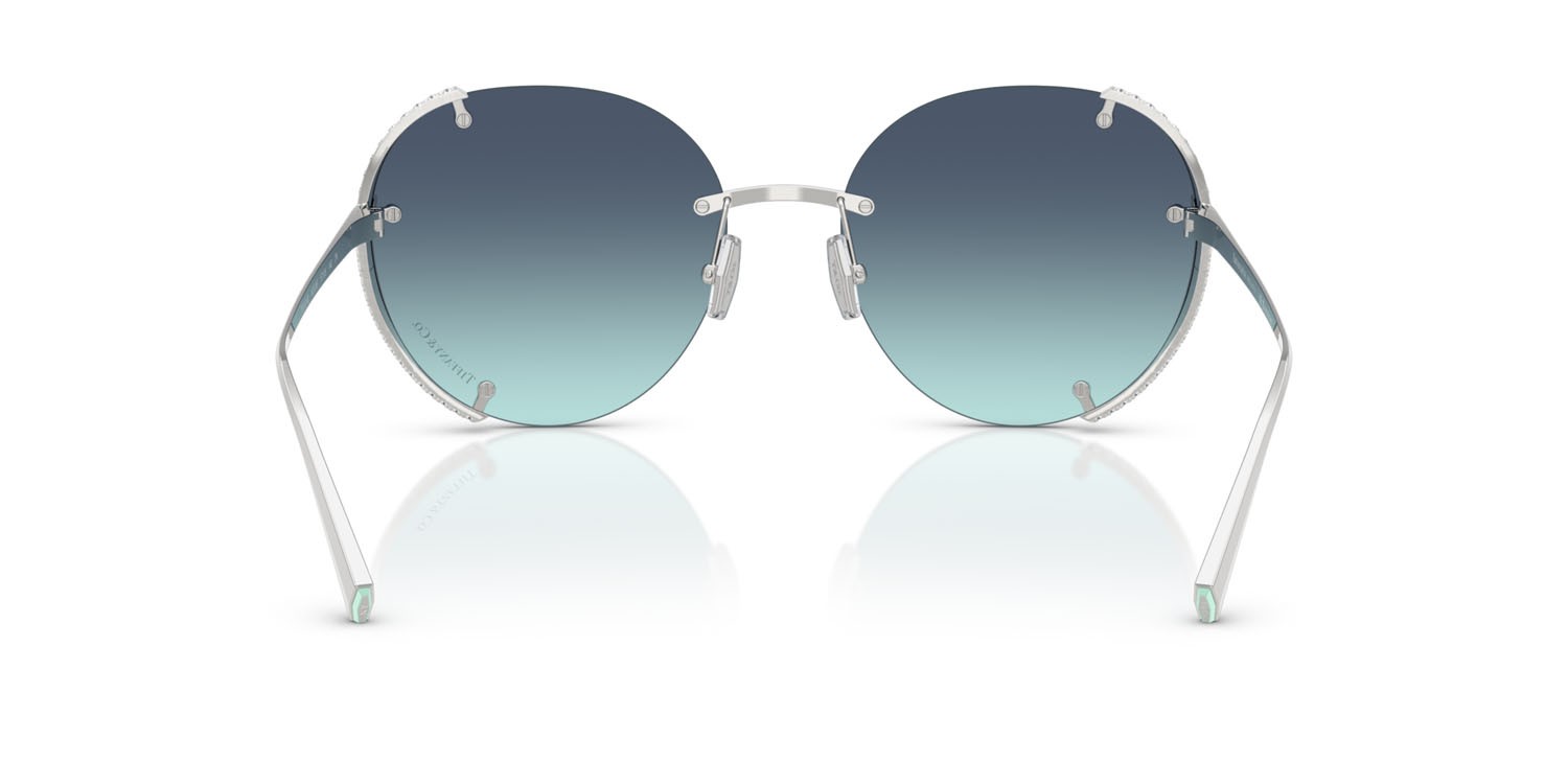 Occhiali da sole Tiffany TF 3110KB (62139S) colore argento placcato oro forma rotondo lenti azzurro sfumato blu