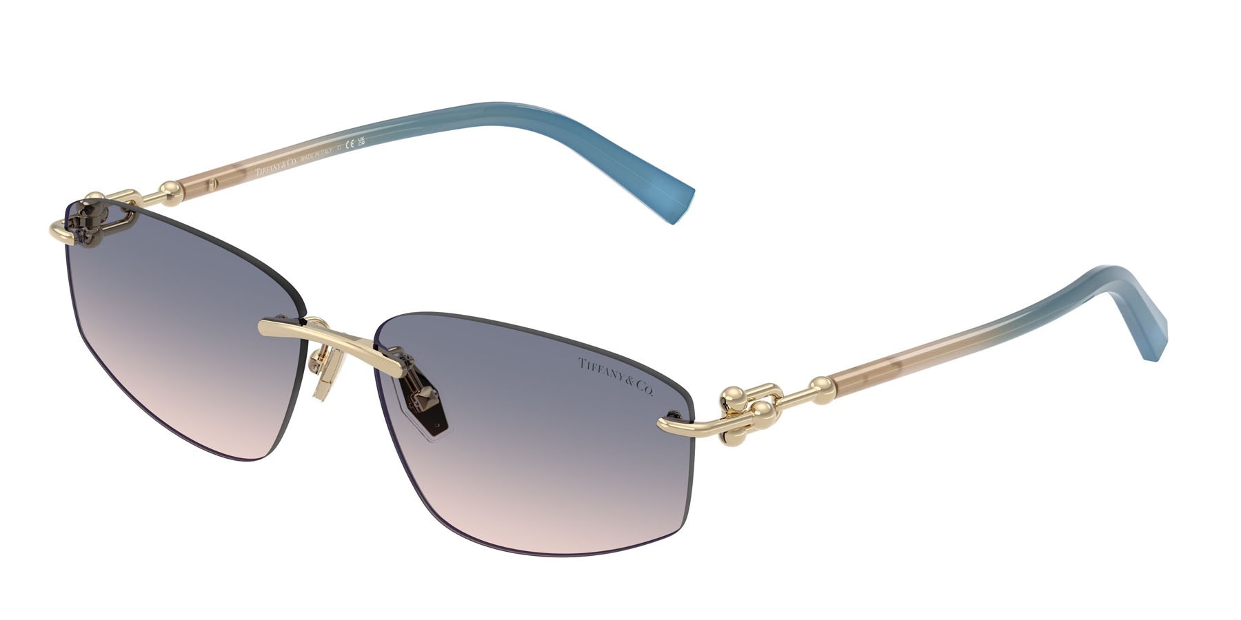 Occhiali da sole Tiffany TF 3114 (619116) colore oro pallido forma irregolare lenti marrone chiaro sfumato blu