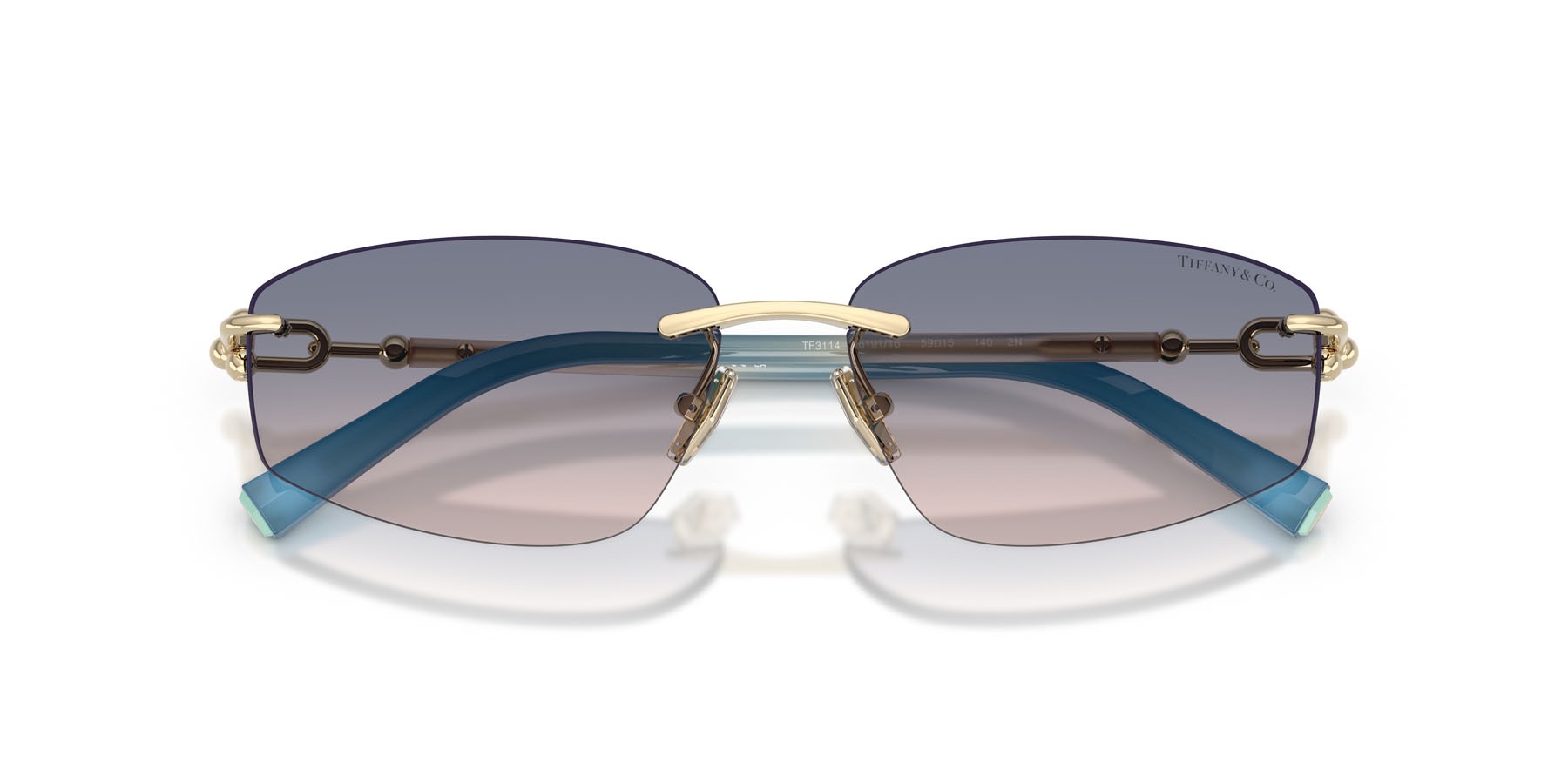 Occhiali da sole Tiffany TF 3114 (619116) colore oro pallido forma irregolare lenti marrone chiaro sfumato blu