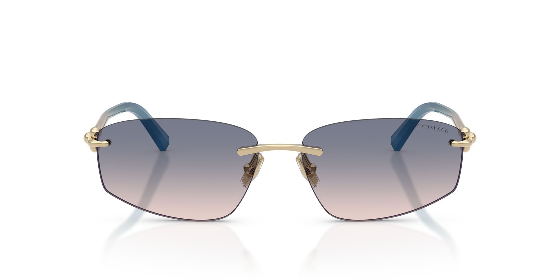 Occhiali da sole Tiffany TF 3114 (619116) colore oro pallido forma irregolare lenti marrone chiaro sfumato blu