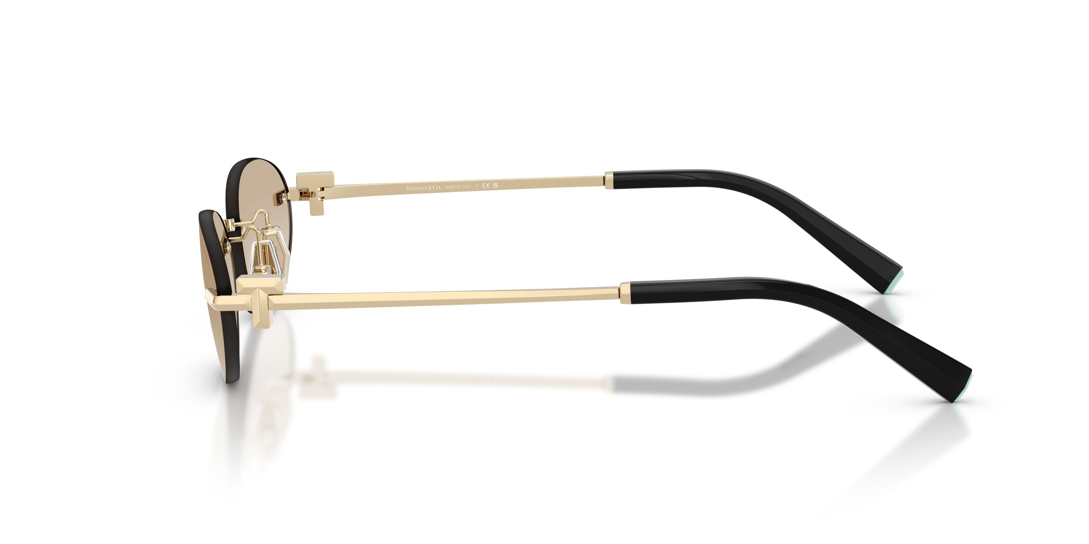 Occhiali da sole Tiffany TF 3119D (623911) colore oro pallido forma ovale lenti trasparente sfumato grigio chiaro
