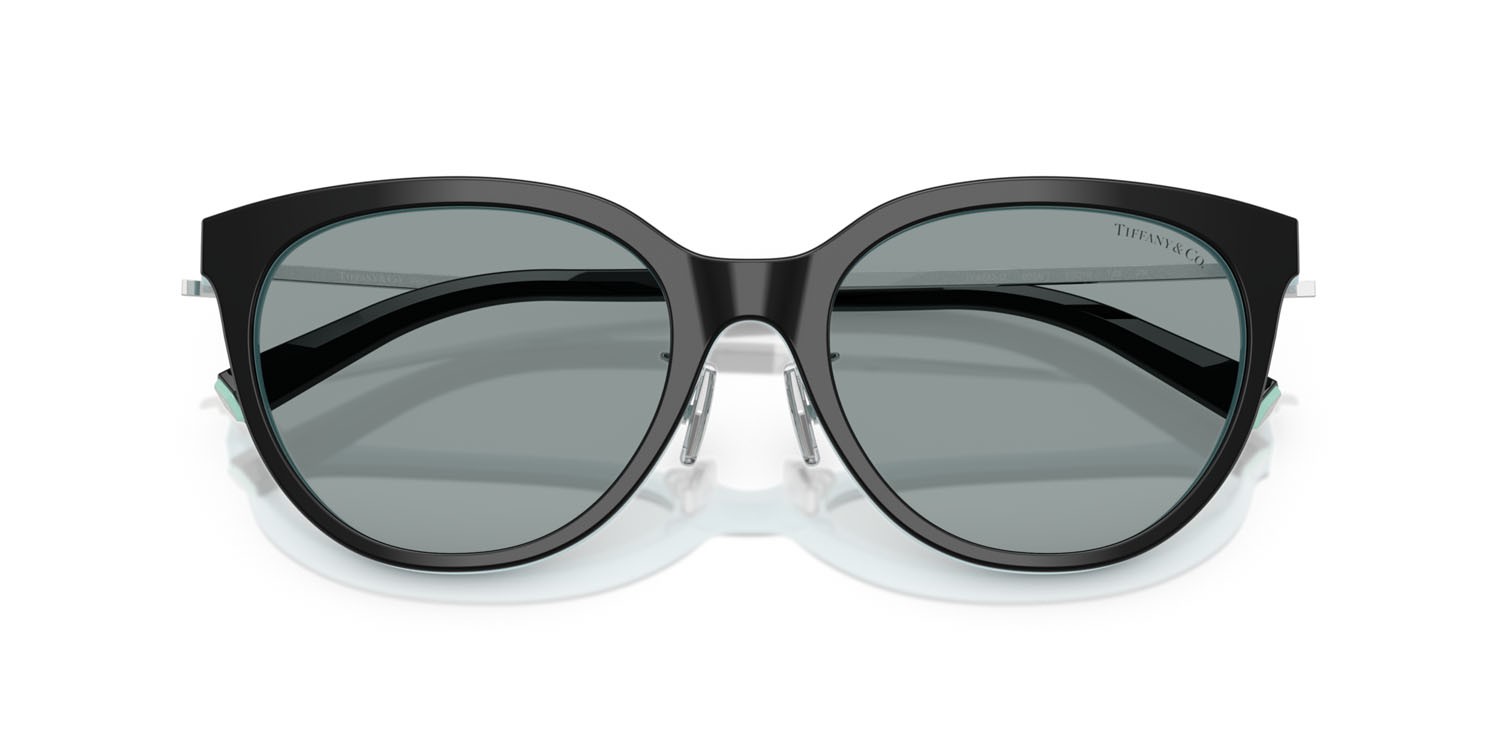 Occhiali da sole Tiffany TF 4243D (8055/1) colore nero su blu tiffany forma rotondo lenti grigio scuro