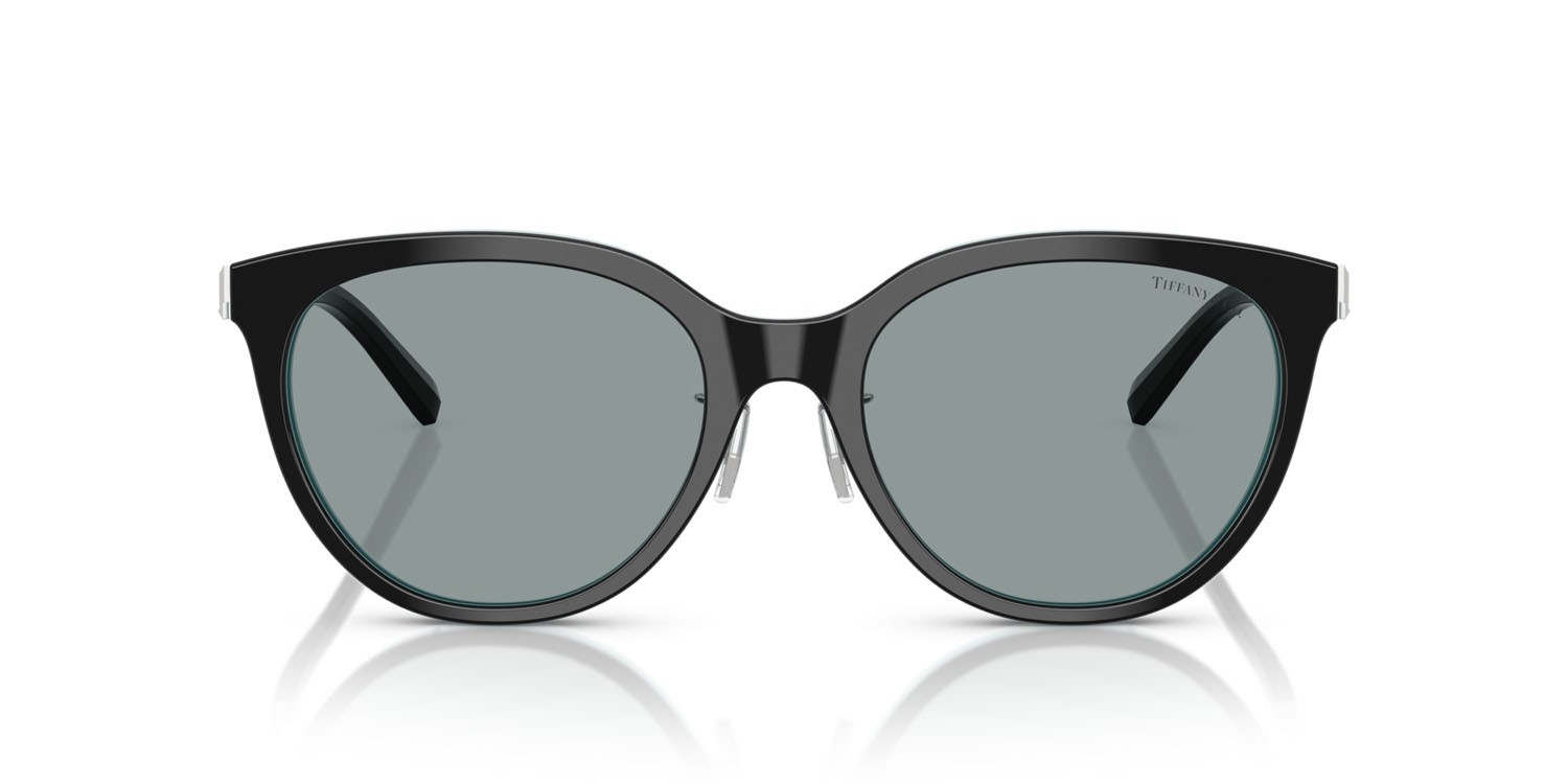 Occhiali da sole Tiffany TF 4243D (8055/1) colore nero su blu tiffany forma rotondo lenti grigio scuro