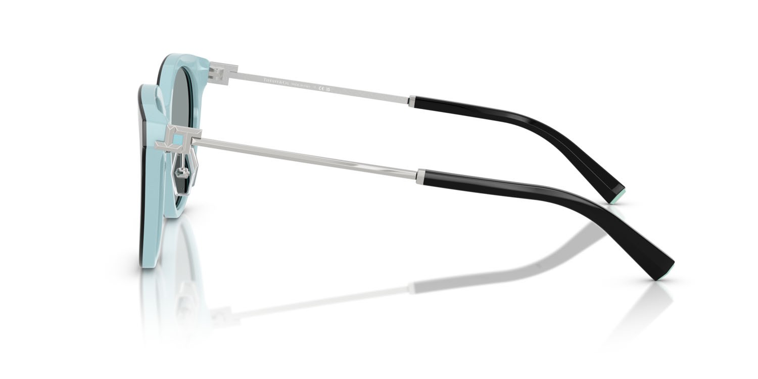 Occhiali da sole Tiffany TF 4243D (8055/1) colore nero su blu tiffany forma rotondo lenti grigio scuro