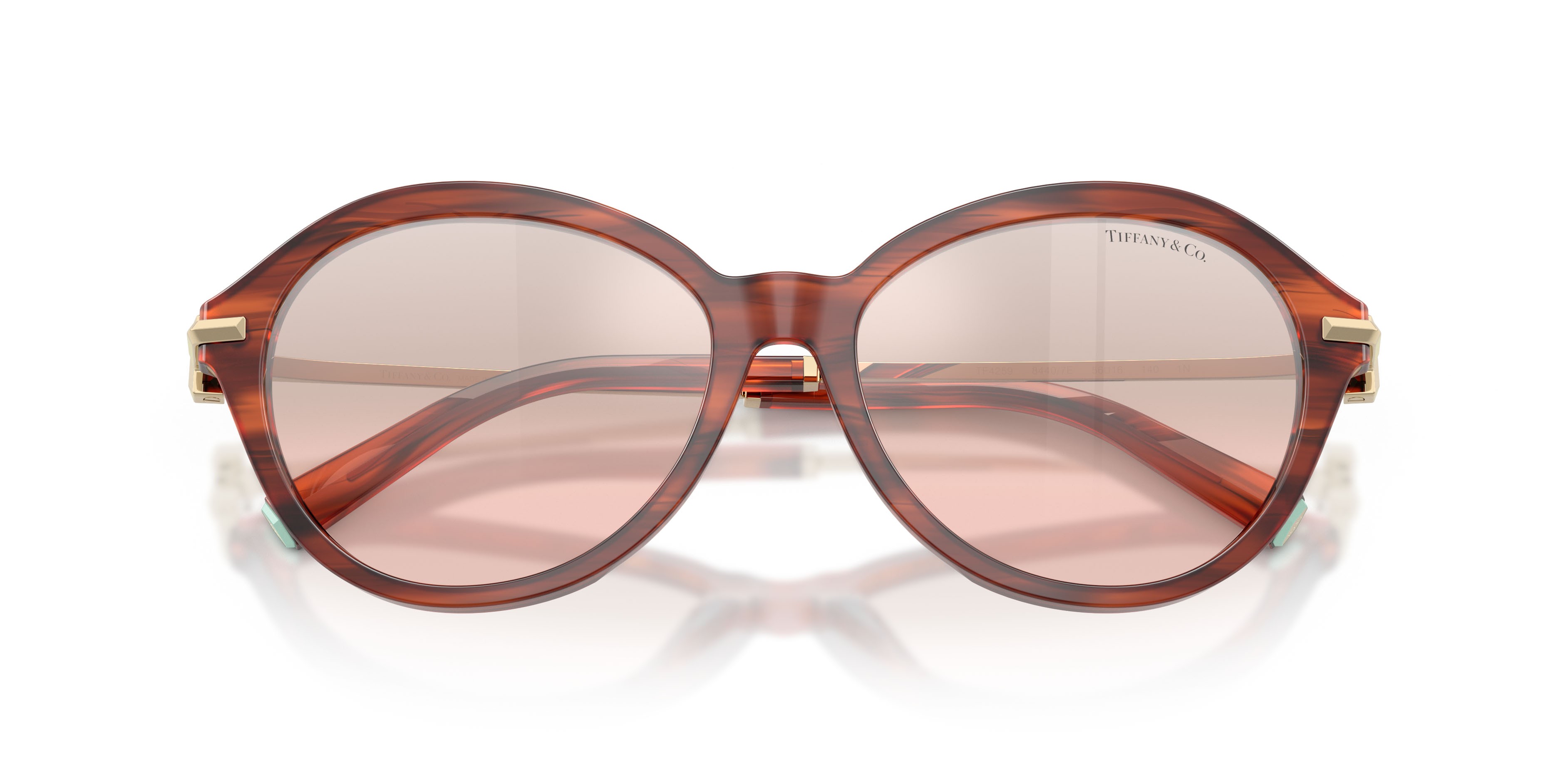 Occhiali da sole Tiffany TF 4259 (84407E) colore rubino havana a righe forma rotondo lenti rosa chiaro sfumato argento a specchio