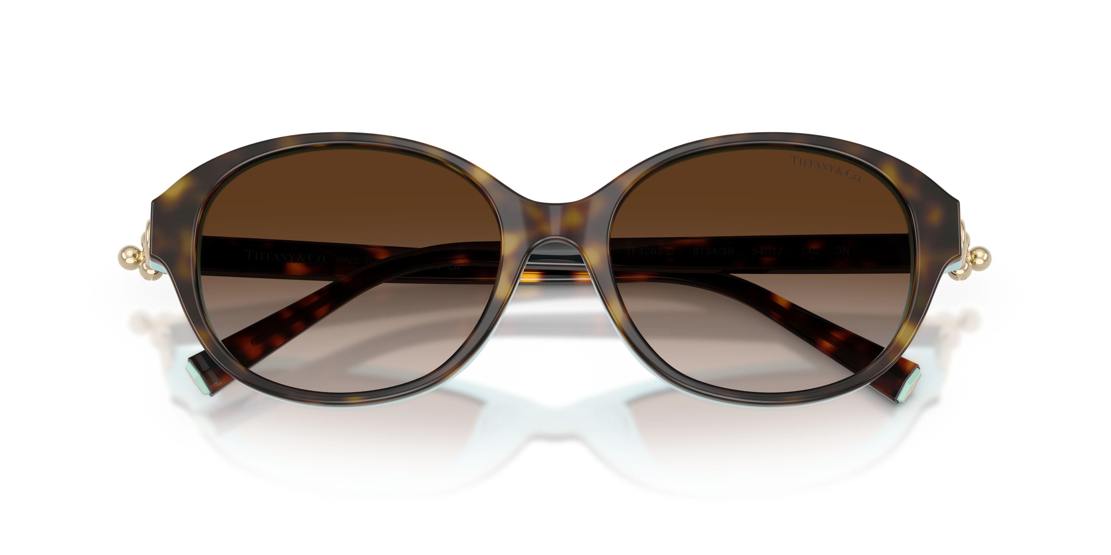 Occhiali da sole Tiffany TF 4263D (81343B) colore havana su blu tiffany forma rotondo lenti marrone sfumato