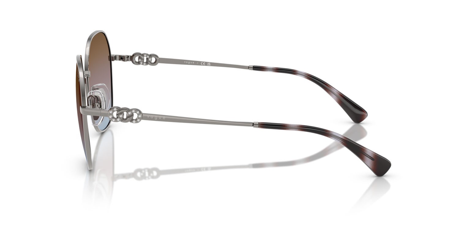 Occhiali da sole Vogue VO 4318SB (548/48) colore gunmetal forma irregolare lenti azure grad pink grad brown
