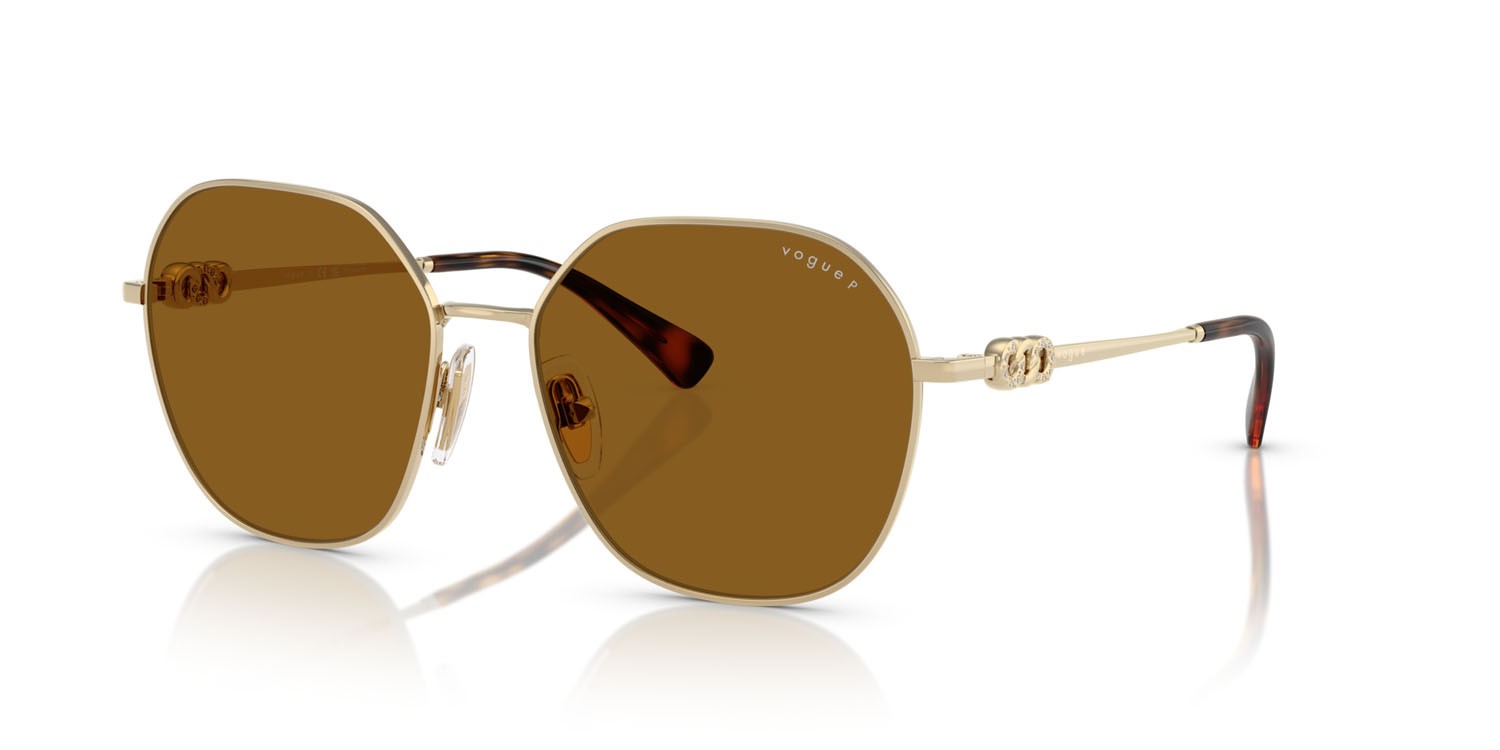 Occhiali da sole Vogue VO 4318SB (848/83) colore oro pallido forma irregolare lenti polar marrone scuro
