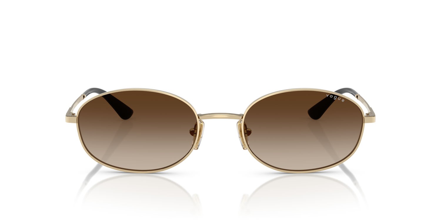 Occhiali da sole Vogue VO 4323S (848/13) colore oro pallido forma ovale lenti gradient dark brown