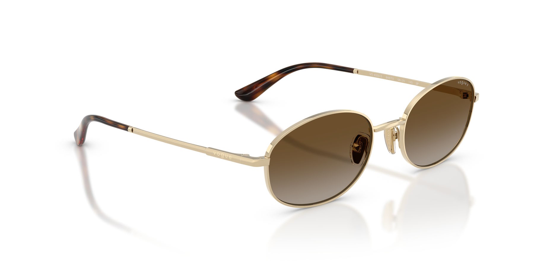 Occhiali da sole Vogue VO 4323S (848/T5) colore oro pallido forma ovale lenti grigio sfumato marrone polarizzata