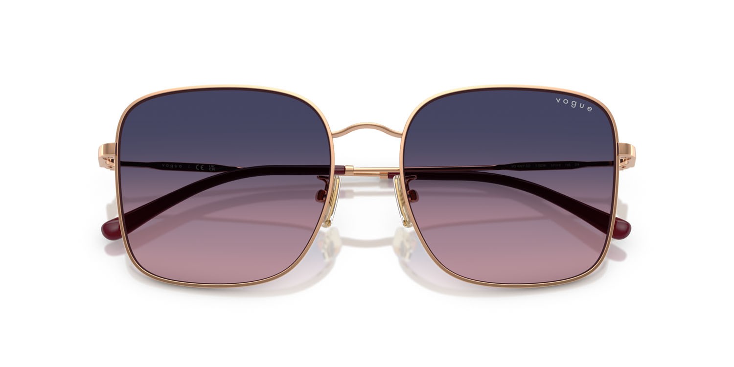 Occhiali da sole Vogue VO 4327SD (5152I6) colore oro rose forma quadrato lenti rosa sfumato blu