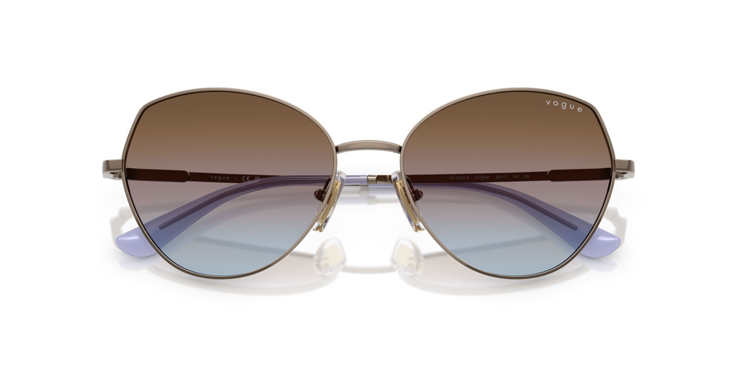 Occhiali da sole Vogue VO 4330S (513848) colore marrone chiaro forma irregolare lenti azzurro sfumato rosa sfumato marrone