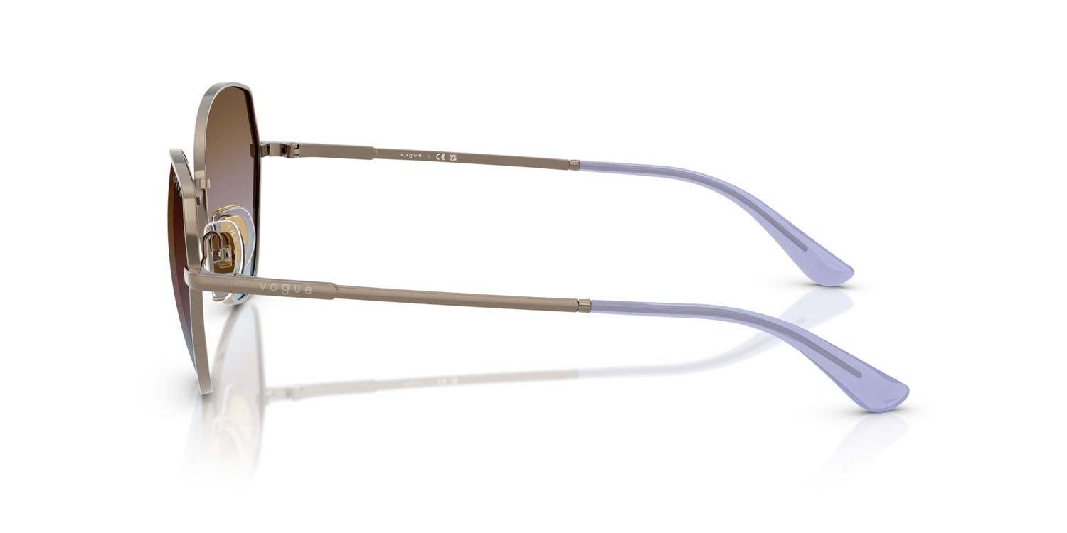 Occhiali da sole Vogue VO 4330S (513848) colore marrone chiaro forma irregolare lenti azzurro sfumato rosa sfumato marrone