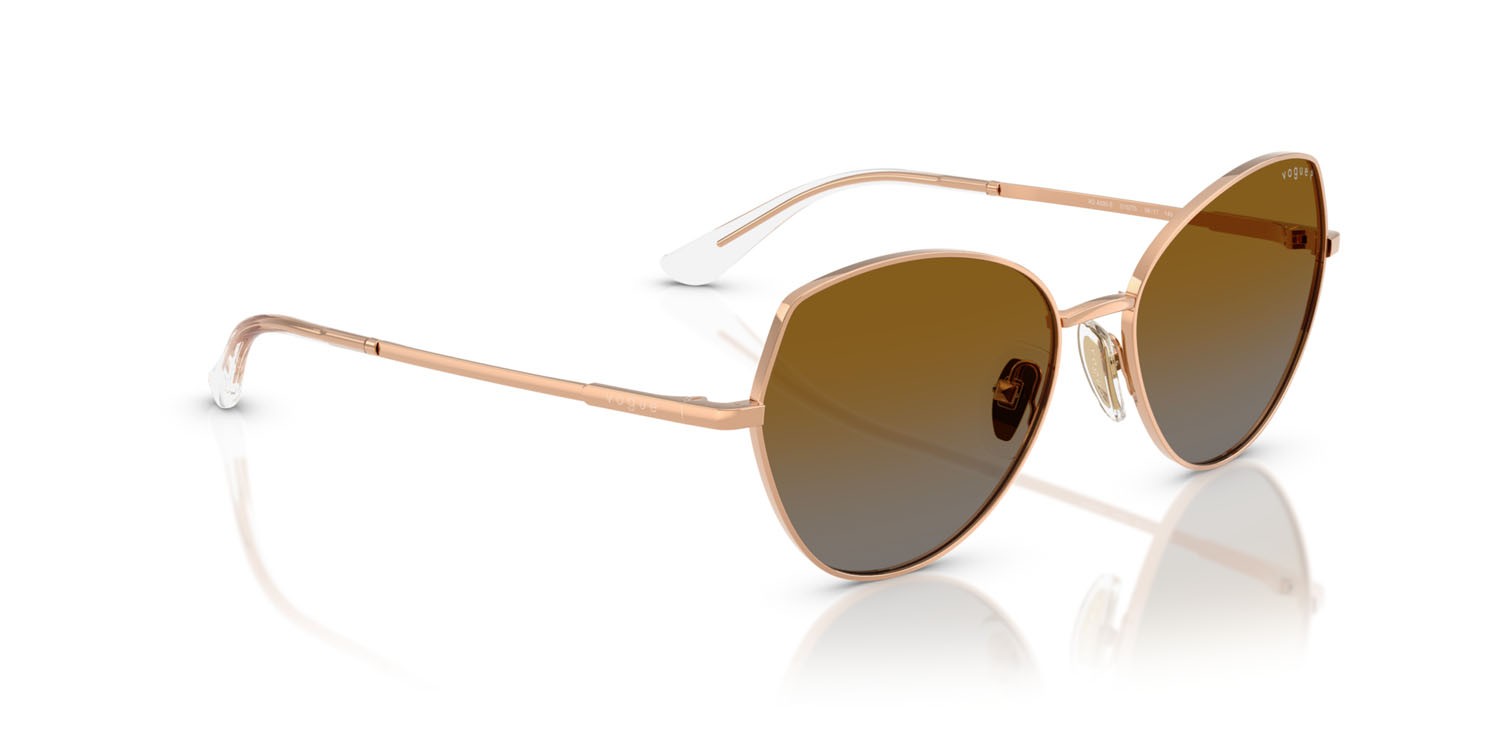 Occhiali da sole Vogue VO 4330S (5152T5) colore oro rose forma irregolare lenti polarizzata grigio sfumato marrone