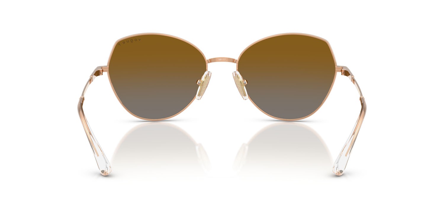 Occhiali da sole Vogue VO 4330S (5152T5) colore oro rose forma irregolare lenti polarizzata grigio sfumato marrone