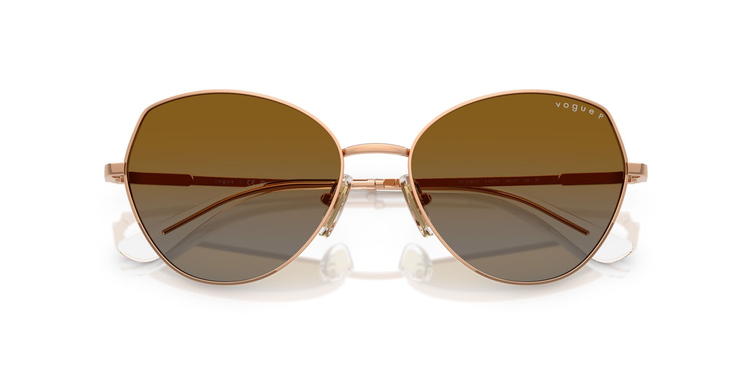 Occhiali da sole Vogue VO 4330S (5152T5) colore oro rose forma irregolare lenti polarizzata grigio sfumato marrone