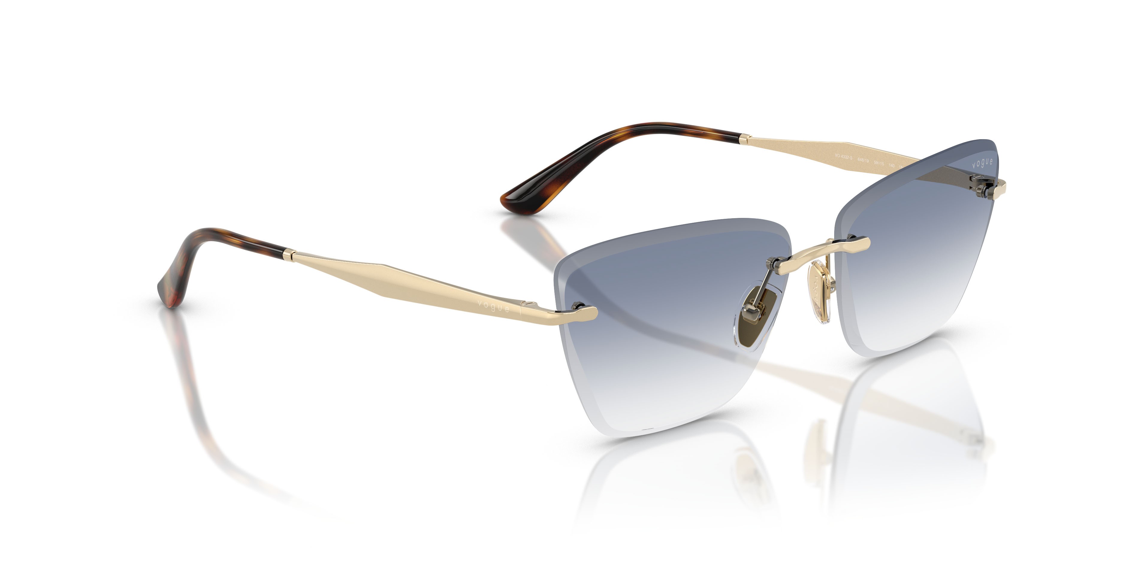 Occhiali da sole Vogue VO 4332S (848/19) colore oro pallido forma cat eye lenti trasparente sfumato azzurro