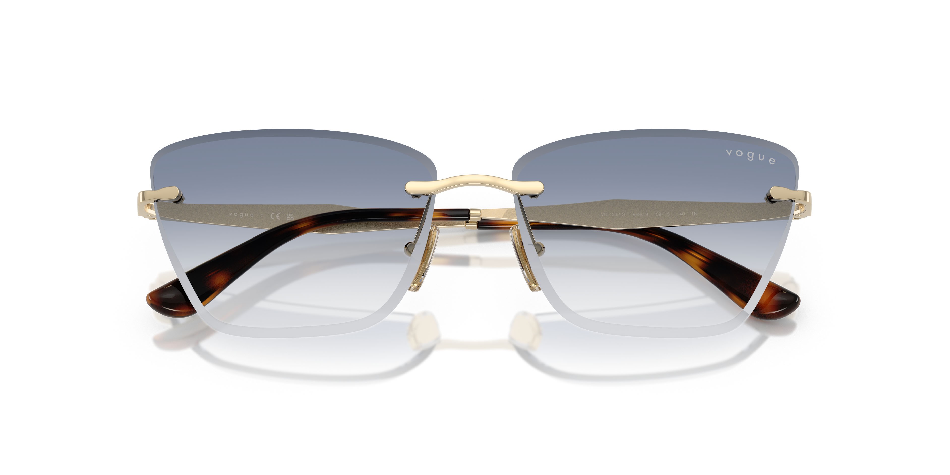 Occhiali da sole Vogue VO 4332S (848/19) colore oro pallido forma cat eye lenti trasparente sfumato azzurro