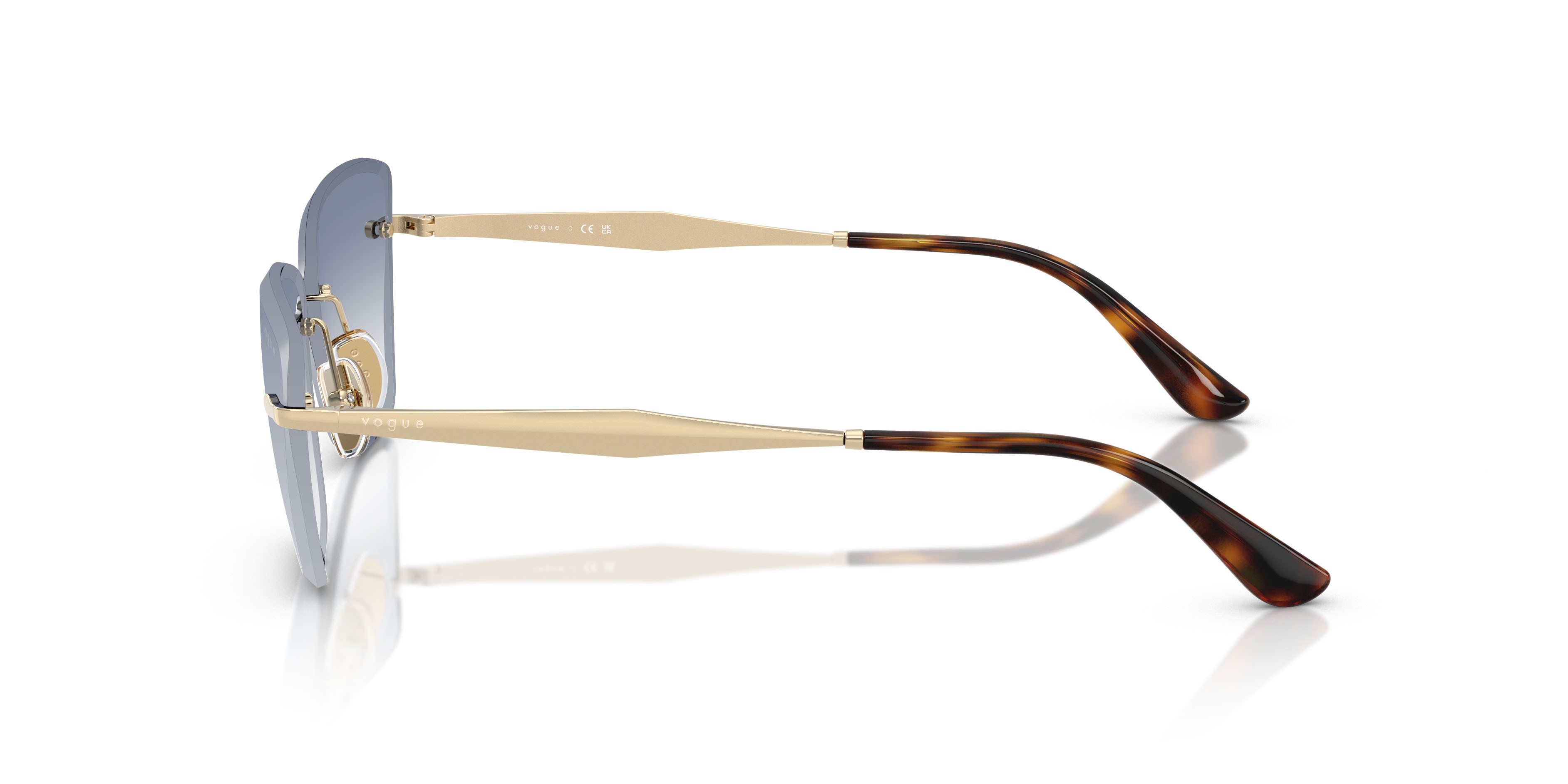 Occhiali da sole Vogue VO 4332S (848/19) colore oro pallido forma cat eye lenti trasparente sfumato azzurro