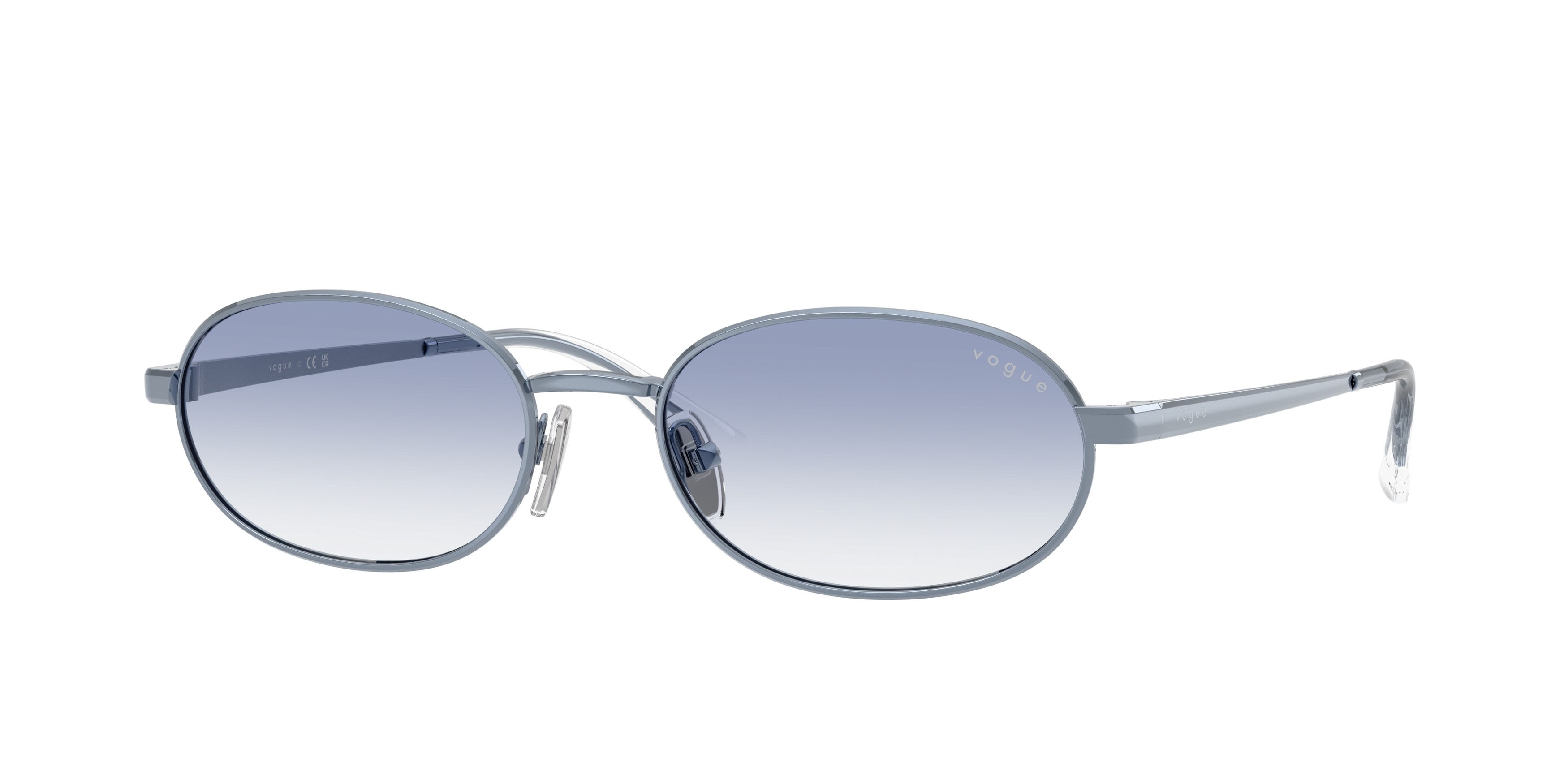 Occhiali da sole Vogue VO 4353S (521419) colore azzurro forma ovale lenti trasparente sfumato azzurro