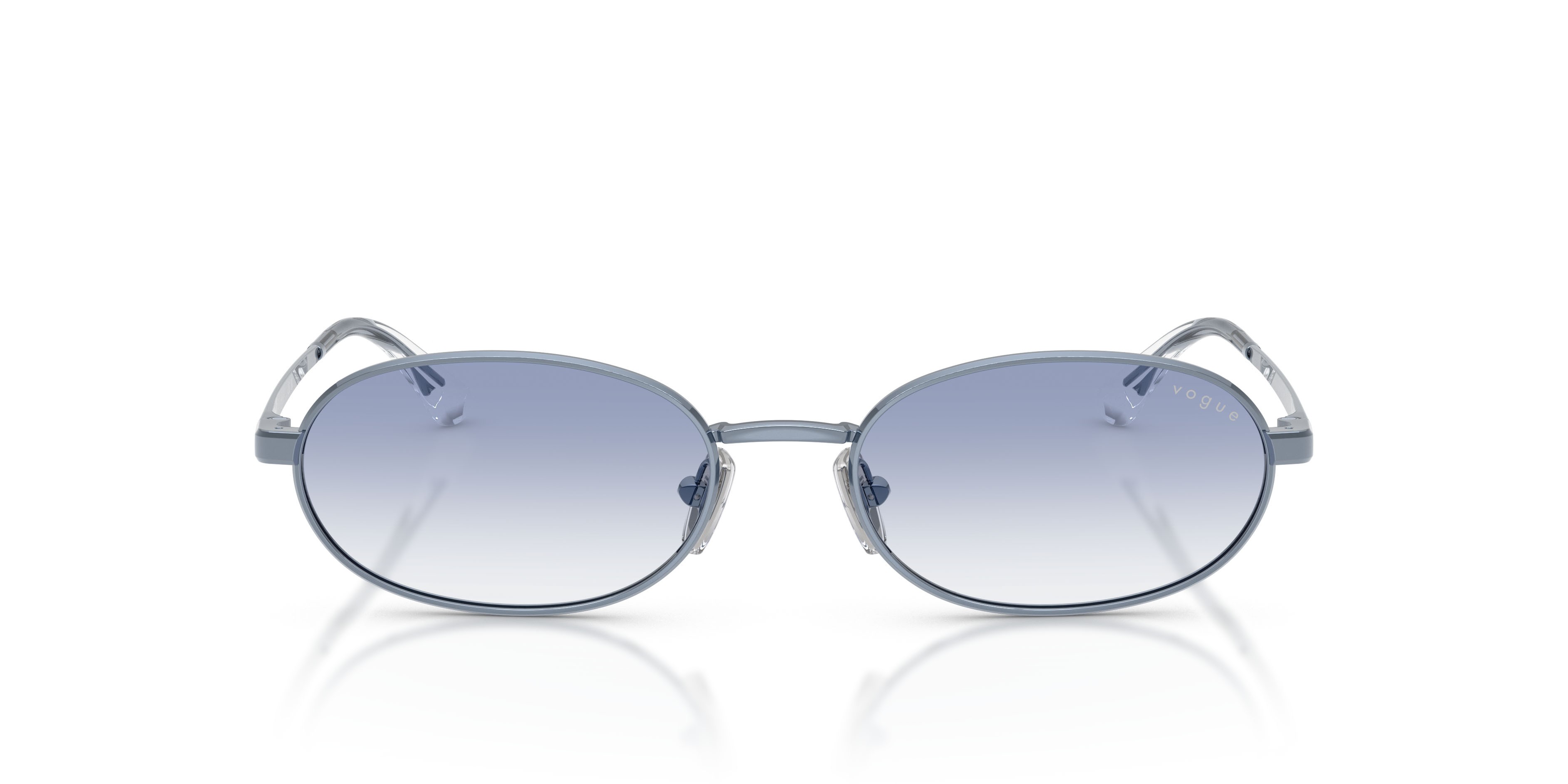 Occhiali da sole Vogue VO 4353S (521419) colore azzurro forma ovale lenti trasparente sfumato azzurro