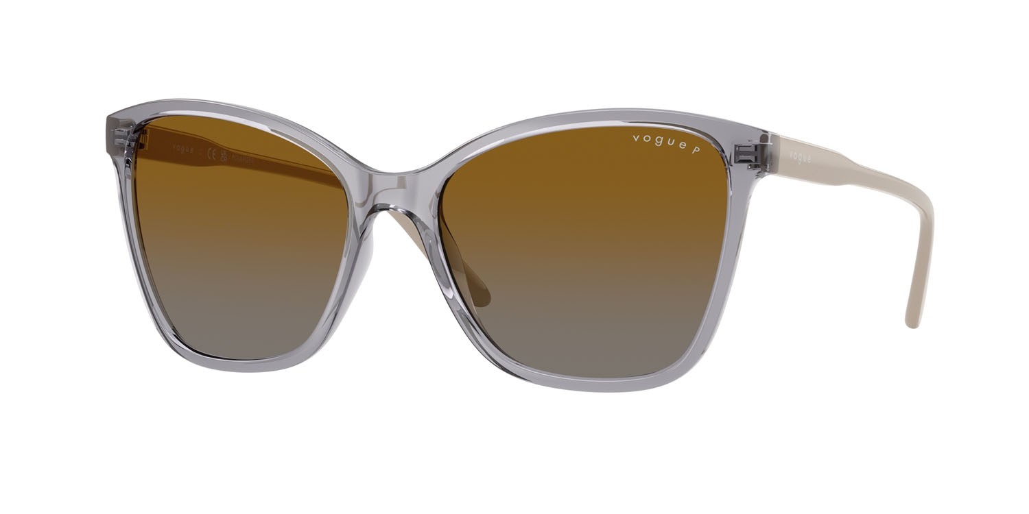Occhiali da sole Vogue VO 5520S (3099T5) colore grigio trasparente forma farfalla lenti polarizzata grigio sfumato marrone