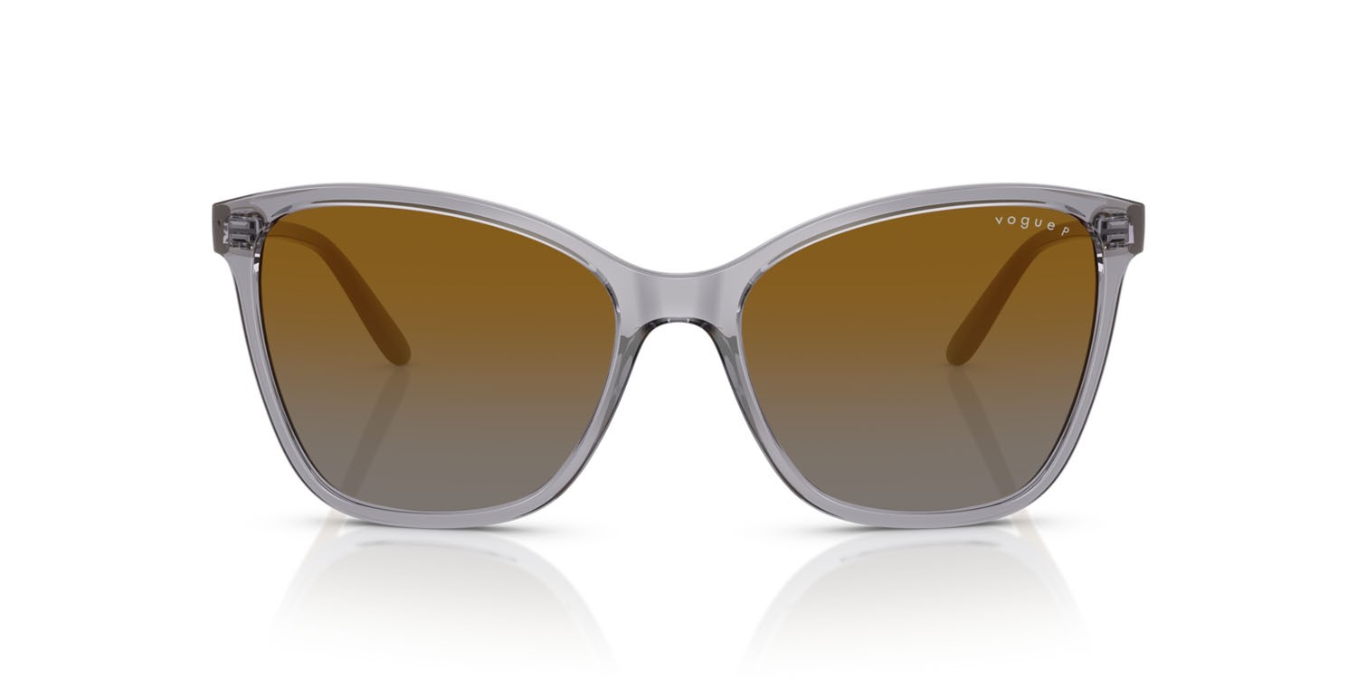Occhiali da sole Vogue VO 5520S (3099T5) colore grigio trasparente forma farfalla lenti polarizzata grigio sfumato marrone