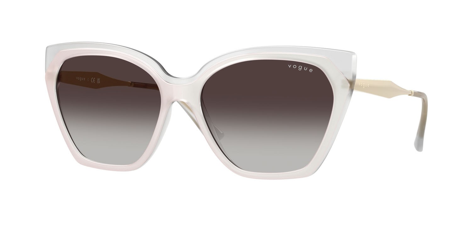 Occhiali da sole Vogue VO 5521S (32208G) colore top bianco/latte opalino forma cat eye lenti sfumato grigio