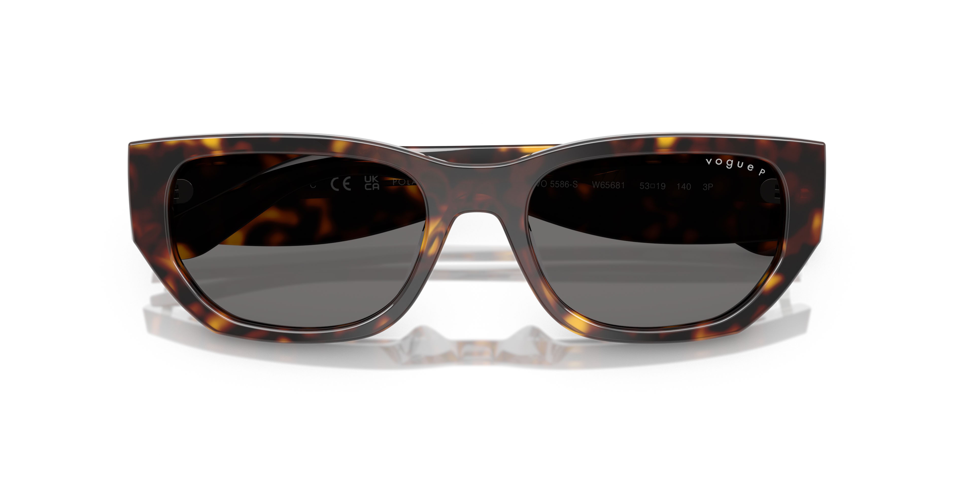 Occhiali da sole Vogue VO 5586S (W65681) colore havana scuro forma rettangolare lenti polar grigio scuro