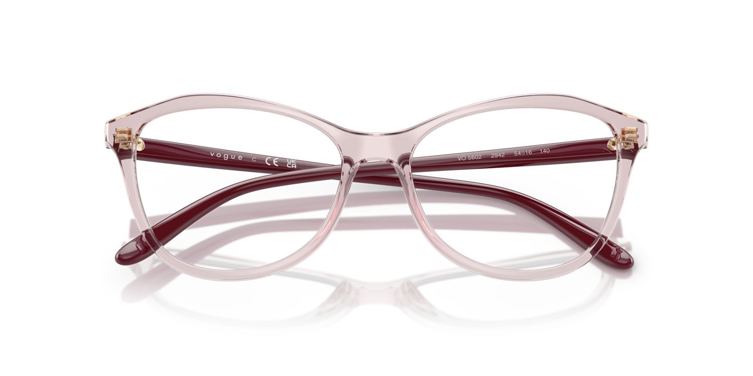 Eyeglasses Vogue VO 5602 (2942) color rosa trasparente shape irregular lenses lente demo
