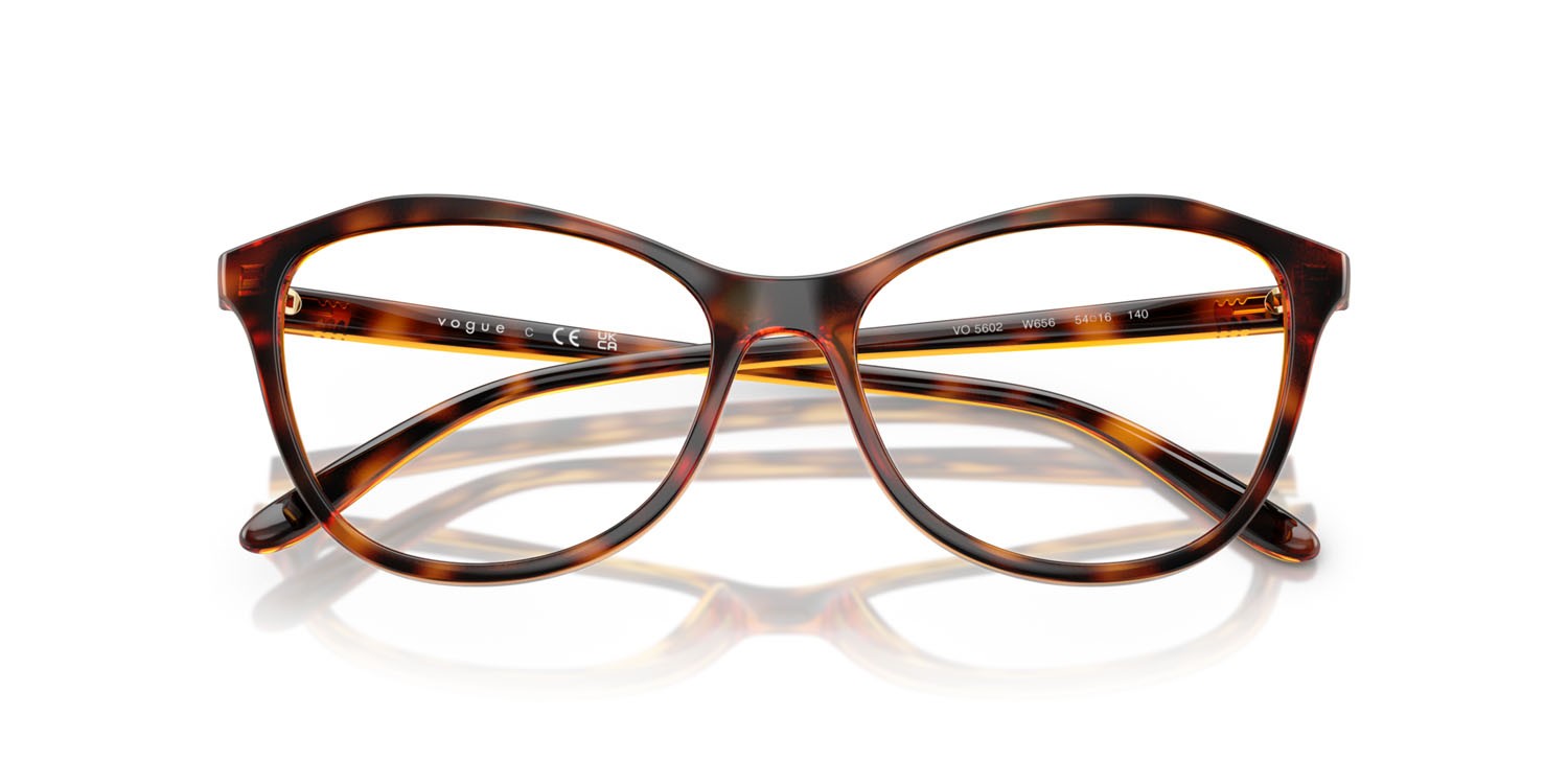 Eyeglasses Vogue VO 5602 (W656) color havana scuro shape irregular lenses lente demo