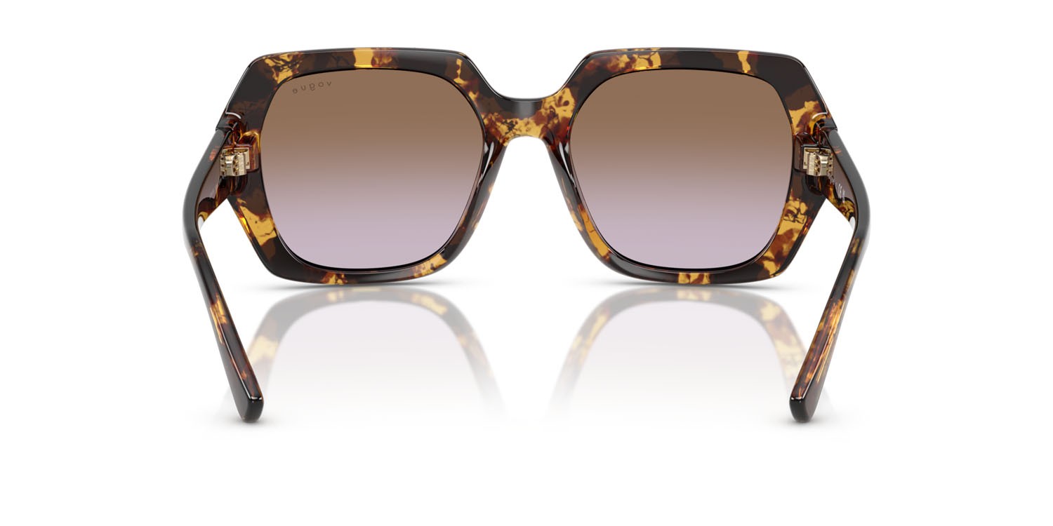 Sunglasses Vogue VO 5612SB (317968) color havana miele shape irregular lenses violetto sfumato marrone