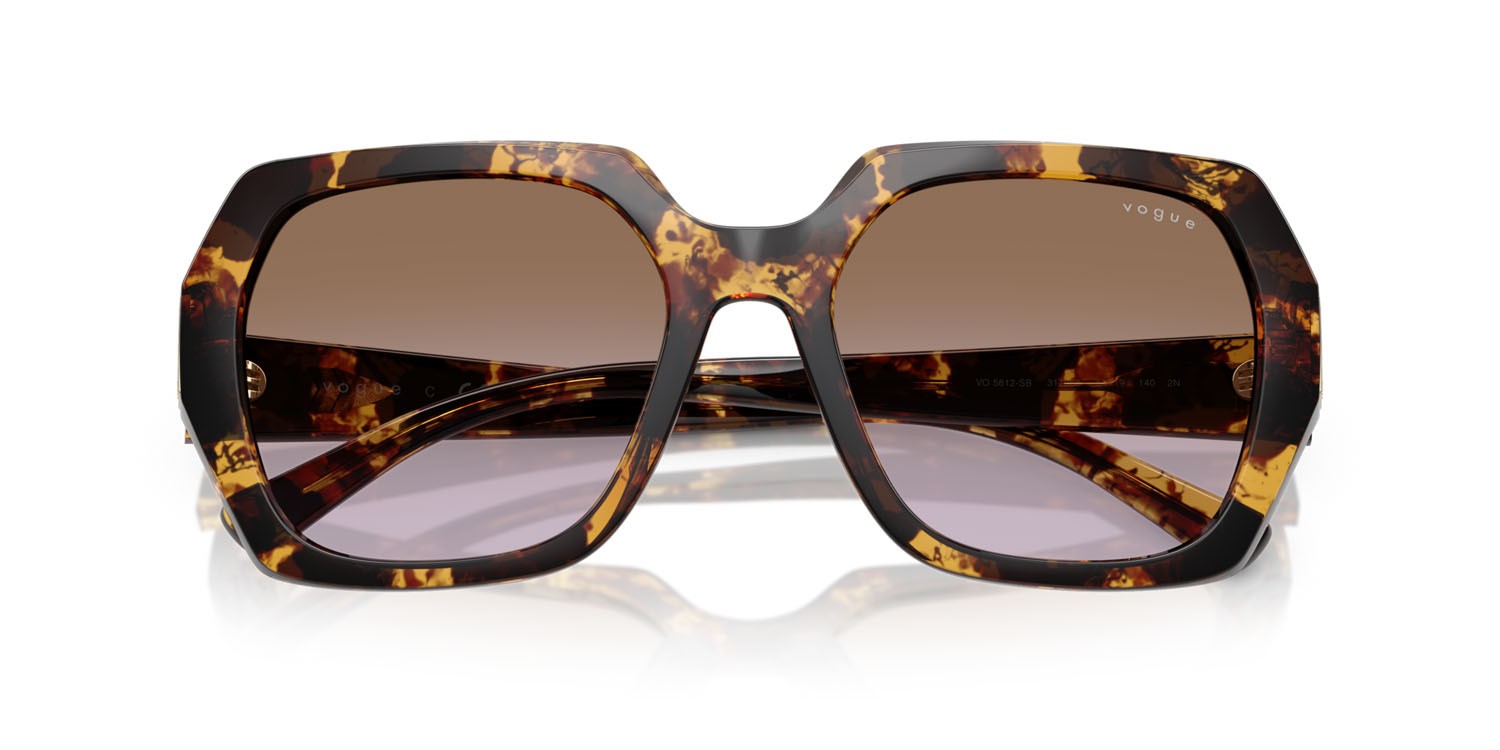 Sunglasses Vogue VO 5612SB (317968) color havana miele shape irregular lenses violetto sfumato marrone
