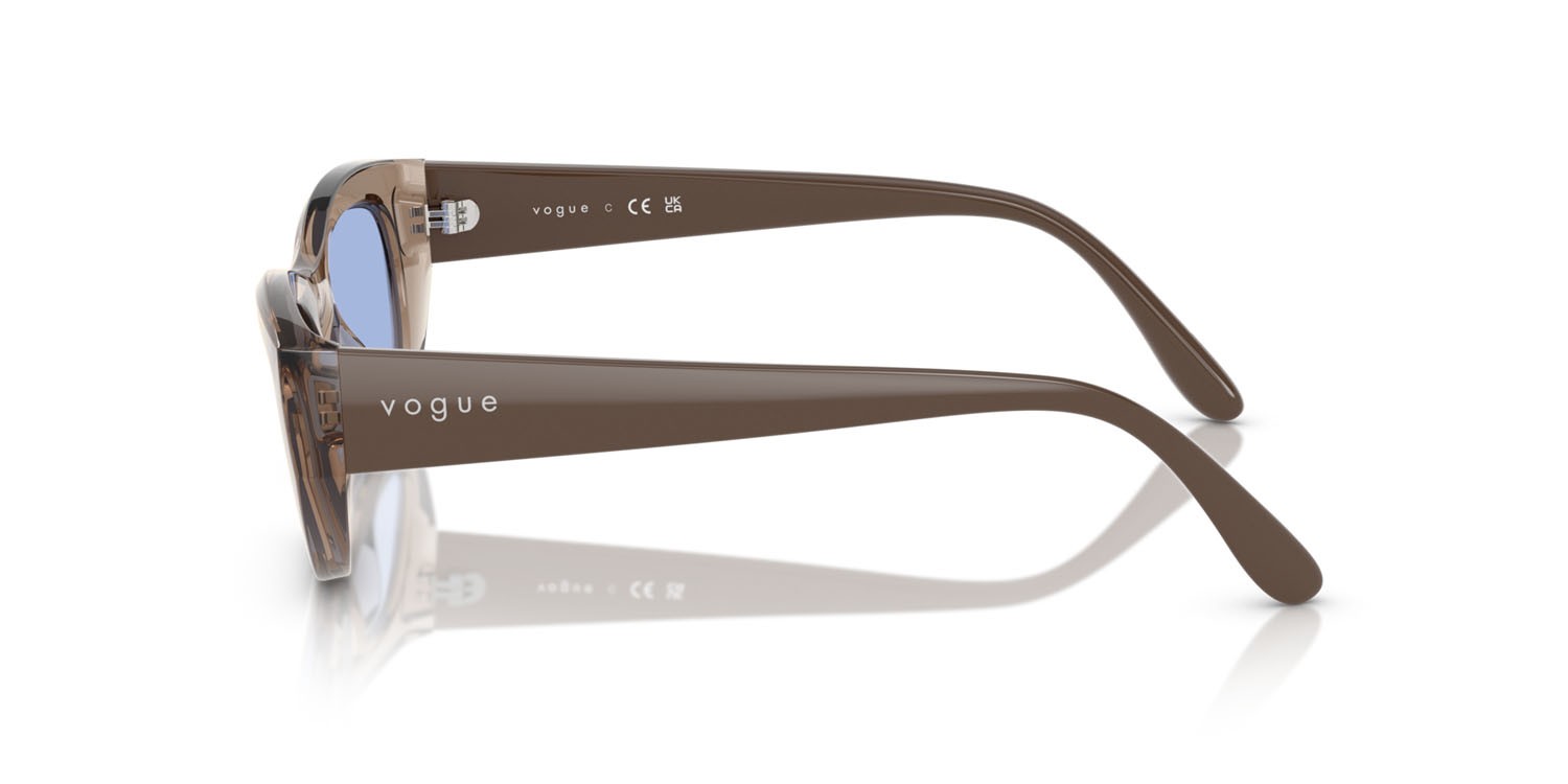 Occhiali da sole Vogue VO 5616S (318172) colore marrone chiaro trasparente forma cat eye lenti blu